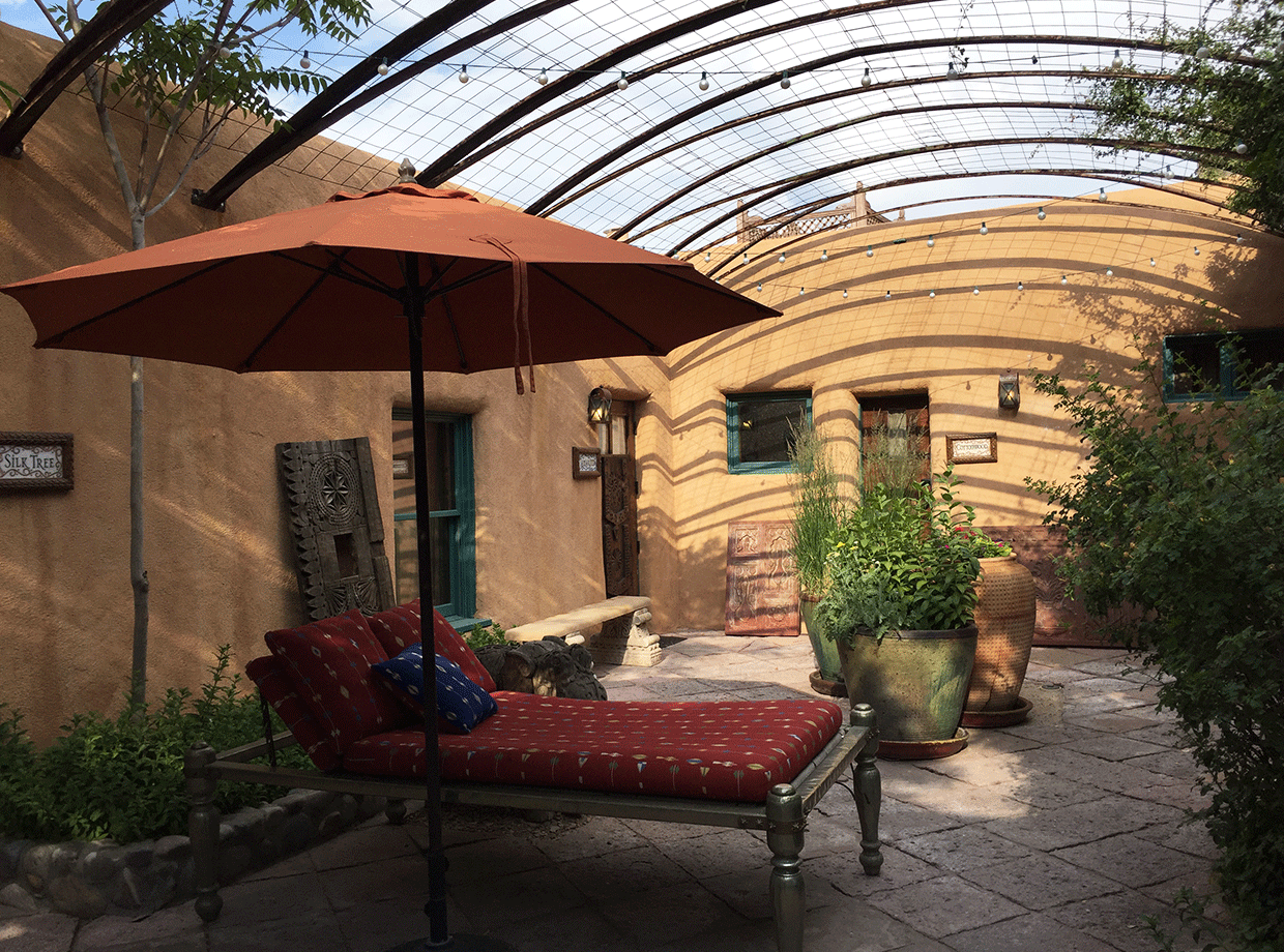 The Inn of Five Graces A day bed in another courtyard. 