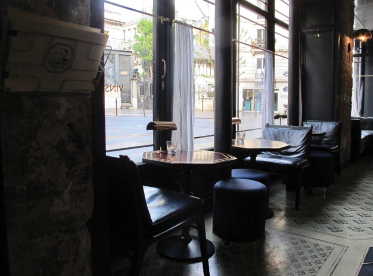 Le Grand Pigalle Hotel Sit with a newspaper and watch the Parisian life go by through the brasserie looking windows. 
