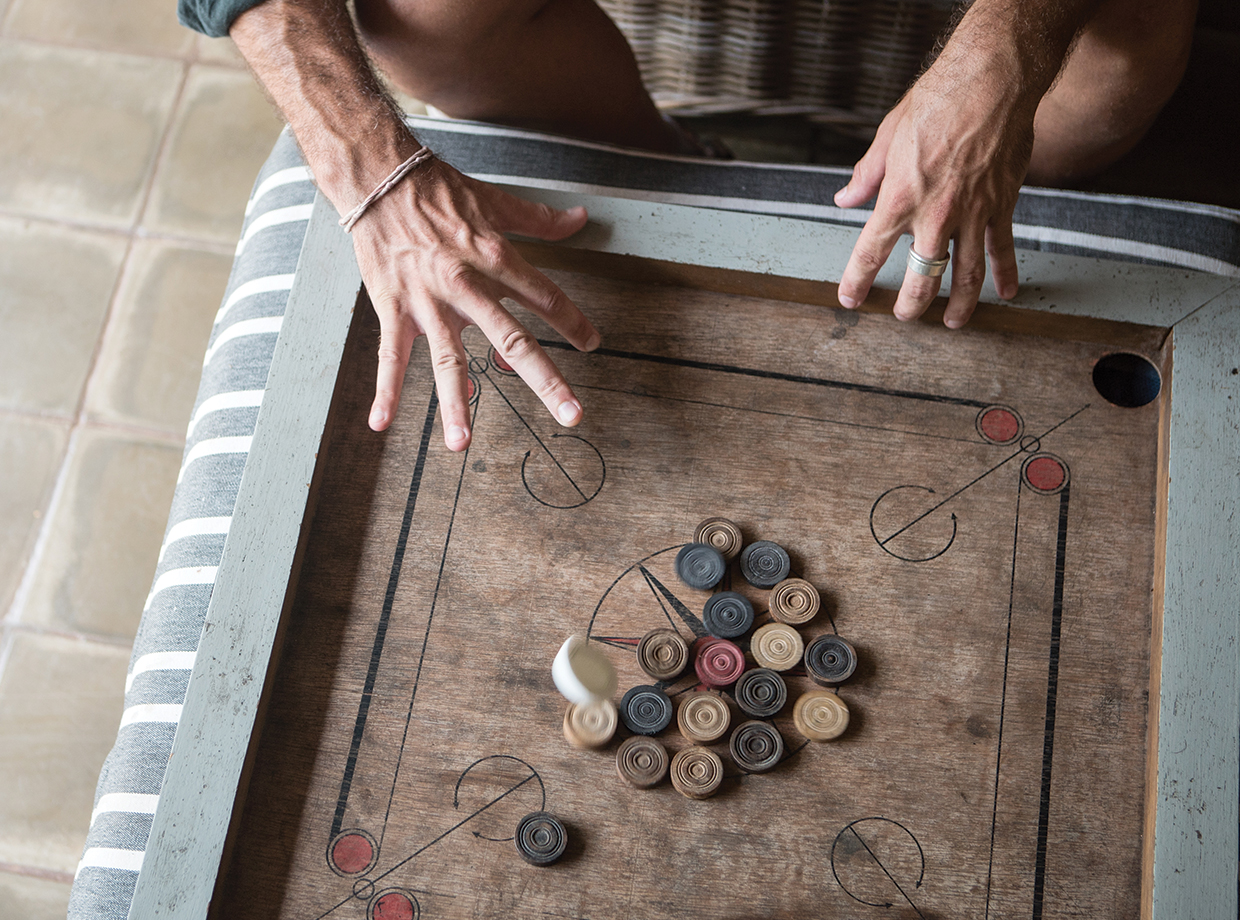 The Wallawwa Carrom – a traditional Sri Lanka board game that is similar to billiards, only you use your fingers to strike and pocket the pieces.