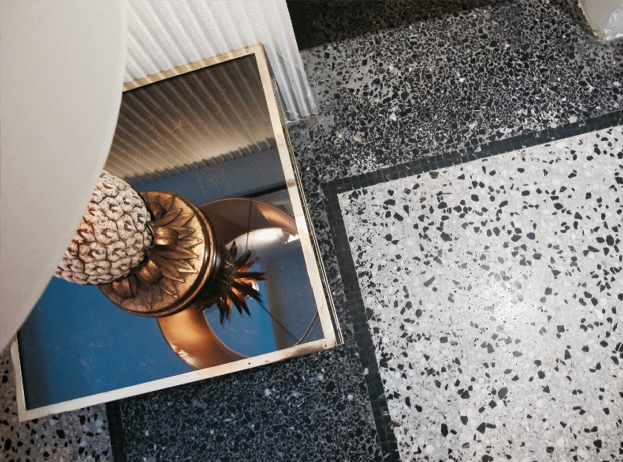 Le Pigalle Pineapples, mirrors and lovely floor are only some of the details in the space. 