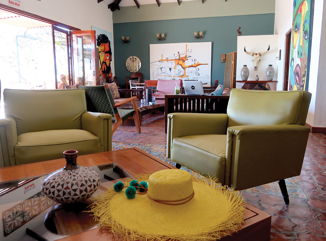 Artesano Hotel Cafe Cozy living room vibes (guilty of photobombing everything with my favorite new hat). 