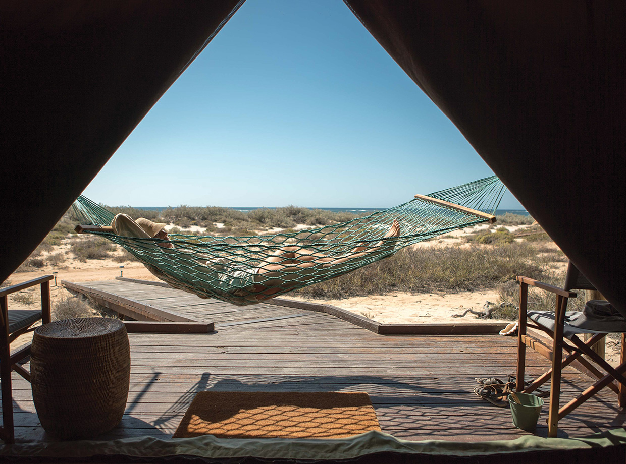 Sal Salis Kicking back in the afternoon sun on the hammock outside our tent. 