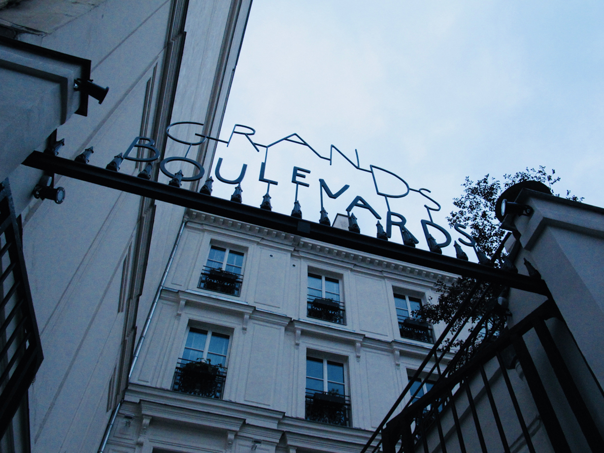 Hotel des Grands Boulevards Subtle and chic sign welcomes you off a bustling Poissonniere Blvrd.