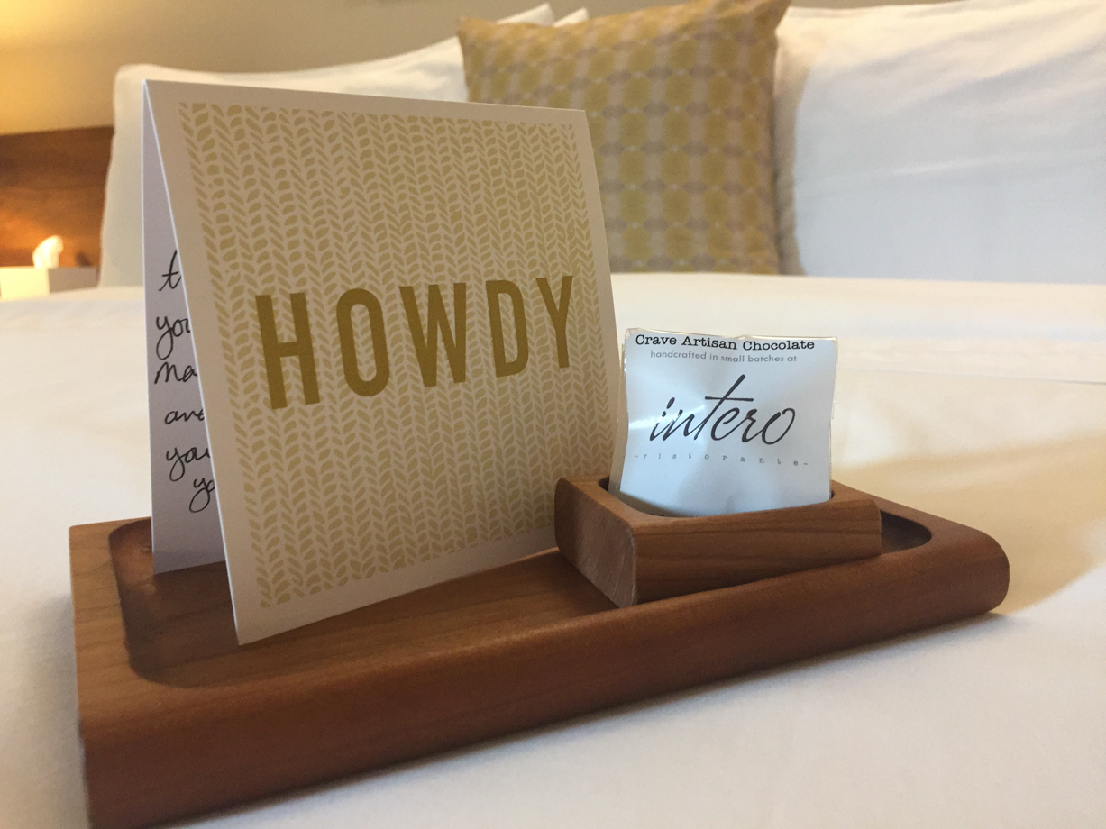 Heywood Hotel Welcome: a note and some excellent local chocolate.
