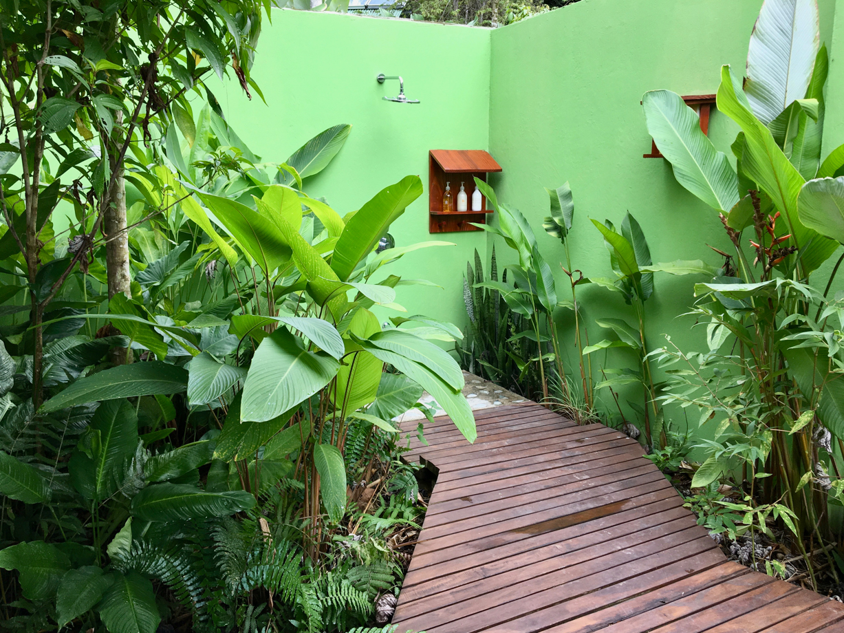 Lapa Rios Taking a shower outside feels like you are in the jungle in the rain!  You can shower and the birds are flying over your head and calling to you. Solar heated hot water on private deck with organic locally made shower products.