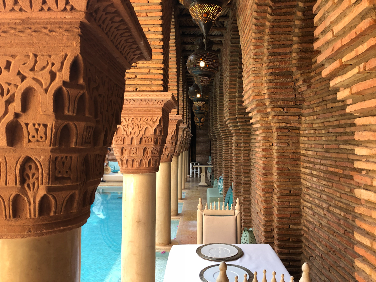 La Sultana Marrakech Quiet corners alongside the pool and dining area.