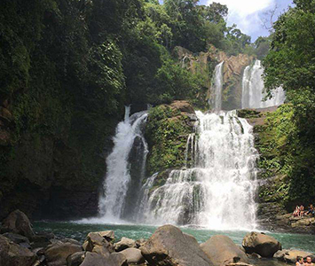 Waterfall repelling or horseback riding.