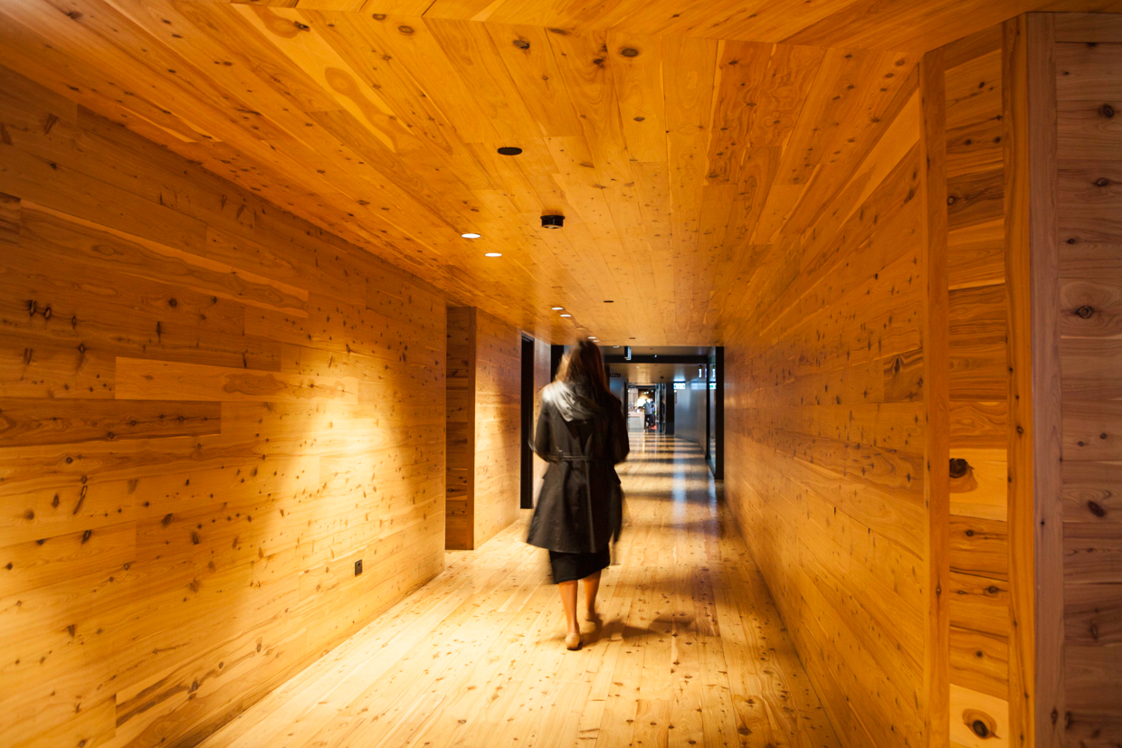 Macq01 Hallways made with wood like a deck of a boat. 
