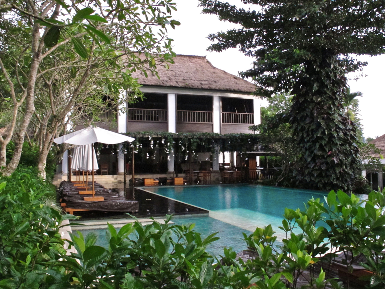 Como Uma Ubud The main house has the bar, pool deck and yoga space upstairs. 
