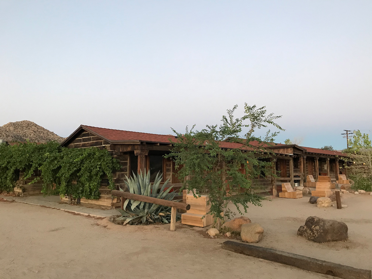 Pioneertown Motel The motel has a classic layout, drive up all the way to your room, or if you have a horse to rock up on, tie the guy up old school way. 