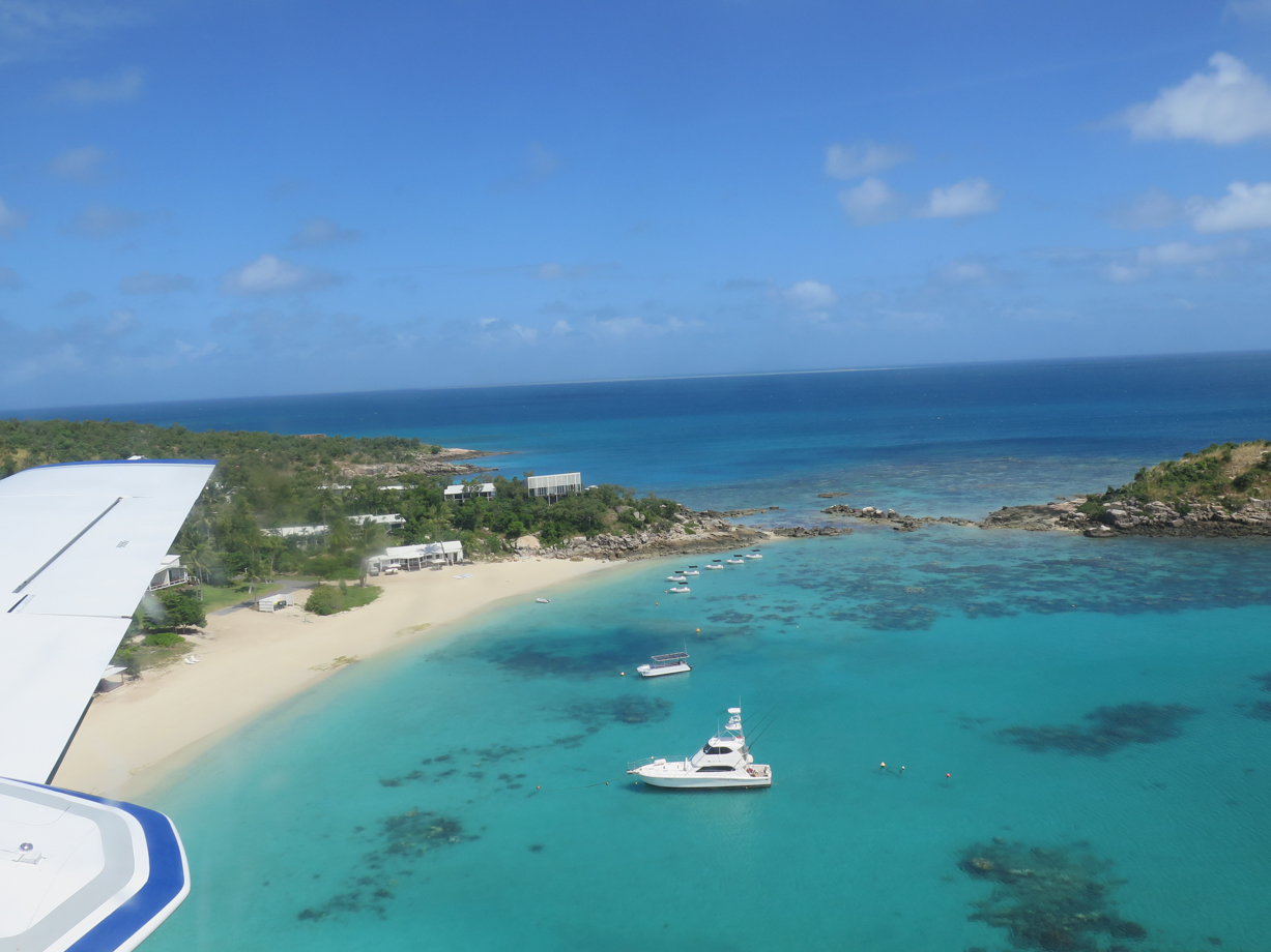 Lizard Island Flying over the turquoise waters surrounding the private island resort.