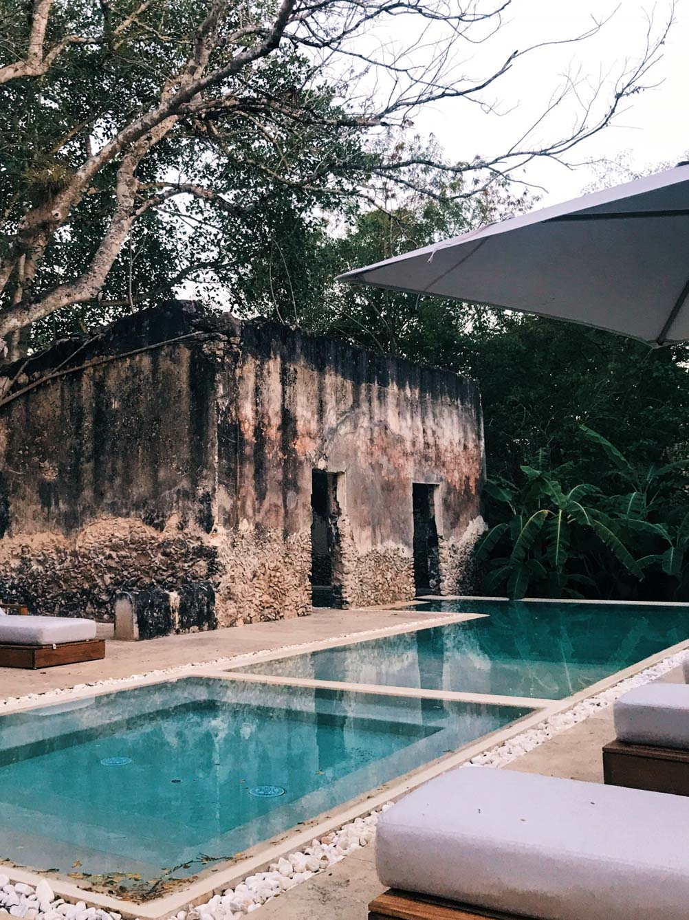 Chablé Behind the spa, relaxation pools have been nestled amongst old stone buildings.