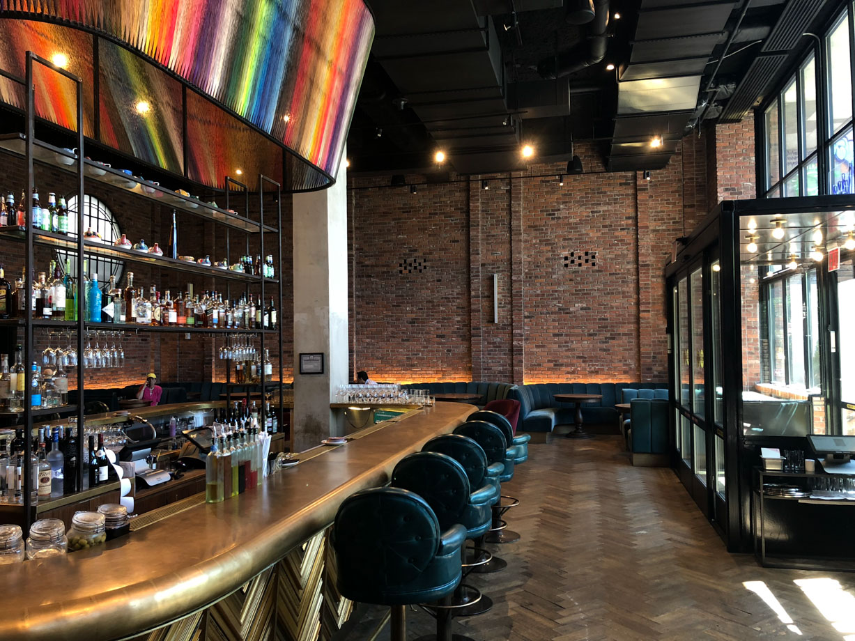 The Williamsburg Hotel Morning light pours into the hotel lobby, with the handsome bar and XX-designed piece as it’s cornerstone.