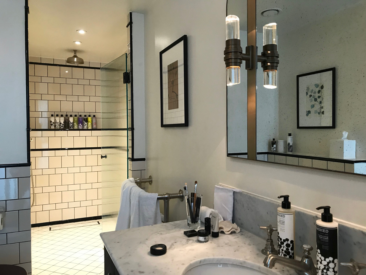 Redchurch Townhouse Really spacious bathroom with an army of Cowshed products to test out. 