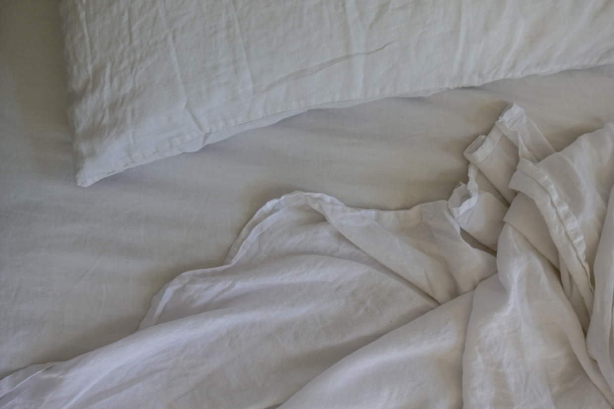 Casa Pueblo Tulum Heavenly, pristine white linen bedsheets.
