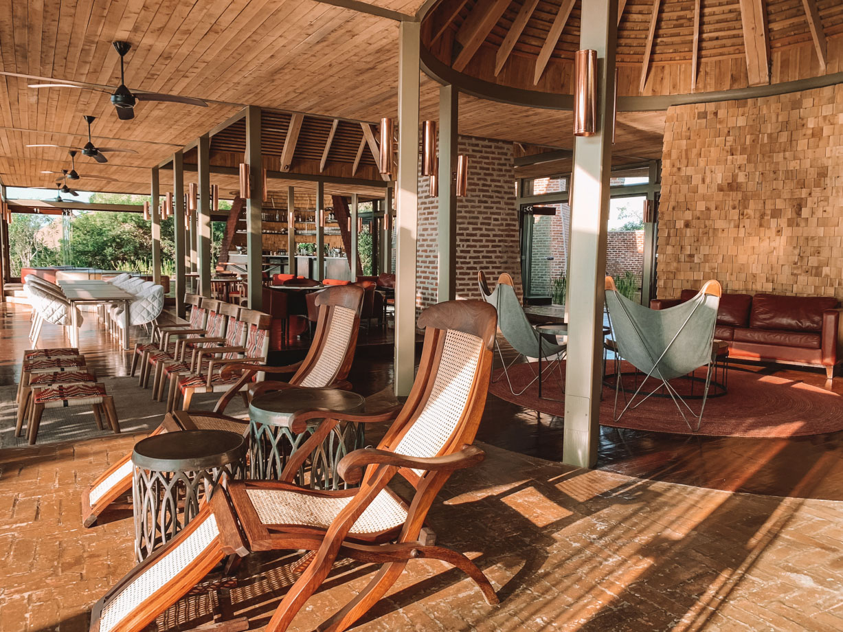 Angama Mara The beautiful brick pavilion is home to the library, restaurant, lounge bar and beautiful deck overlooking the Maasai Mara. 