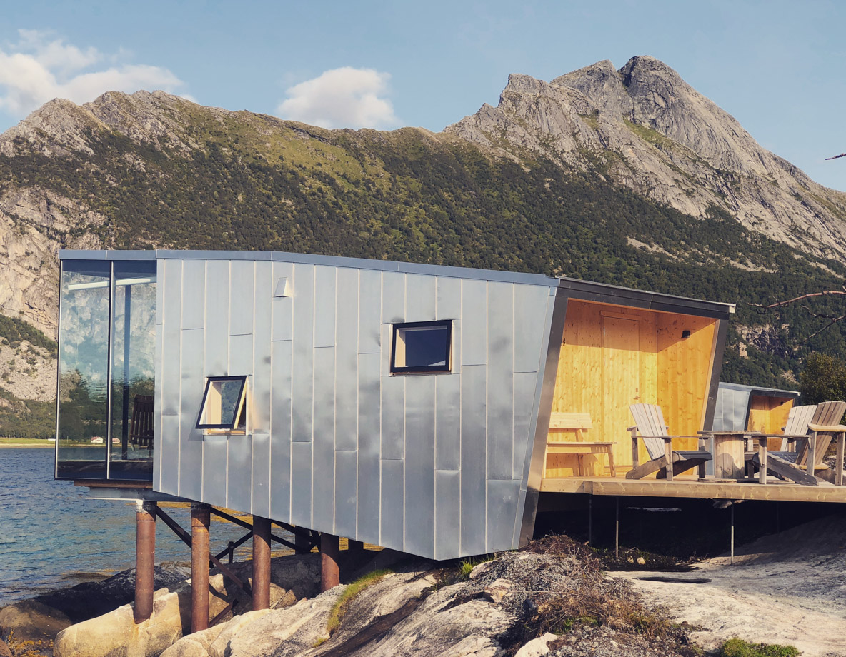 Manshausen One of the newly built sea cabins perfectly placed right on the water with views looking out to the Lofoten Islands in the distance.   