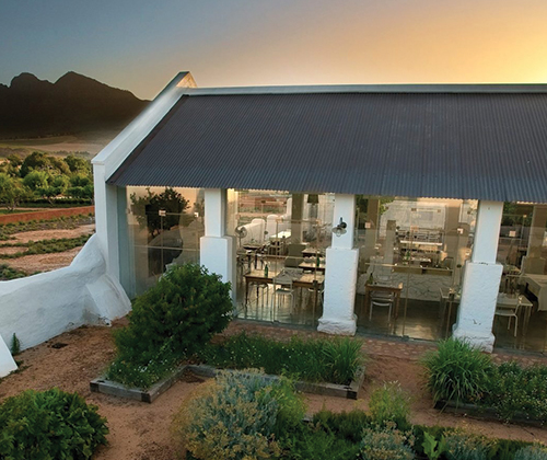 Pop in on your way back to Cape Town, Graze around the estate, do a wine tasting and be sure to pass by the farm shop to stock up on the BEST herbed halloumi and biltong to take home.