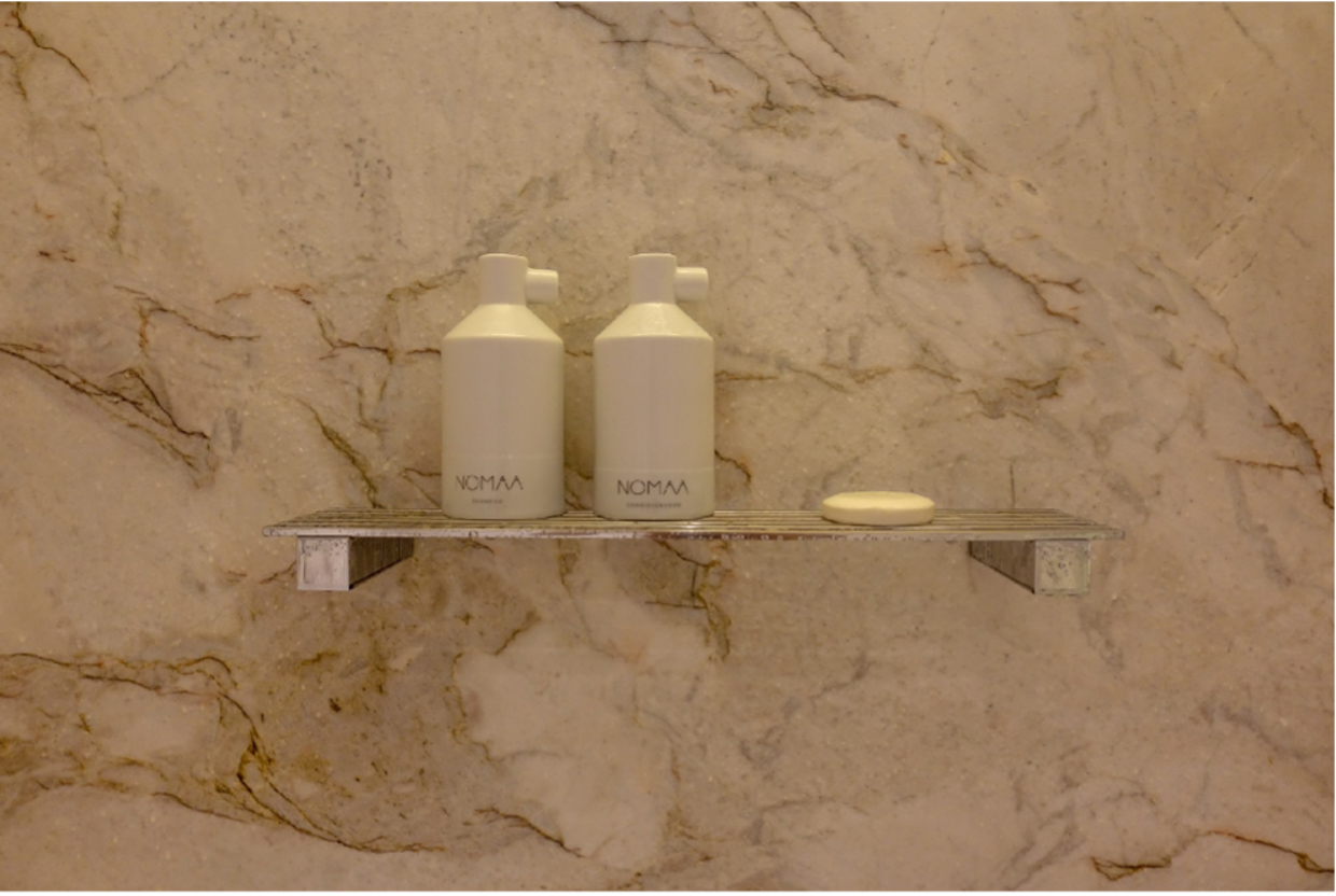 Nomaa Hotel Extra points to the toiletries offered in refillable ceramic containers.