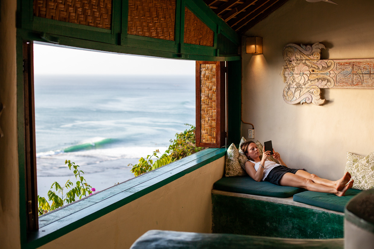 The Temple Lodge Relaxing with a book as waves roll in over Bingin Beach. Heaven. 