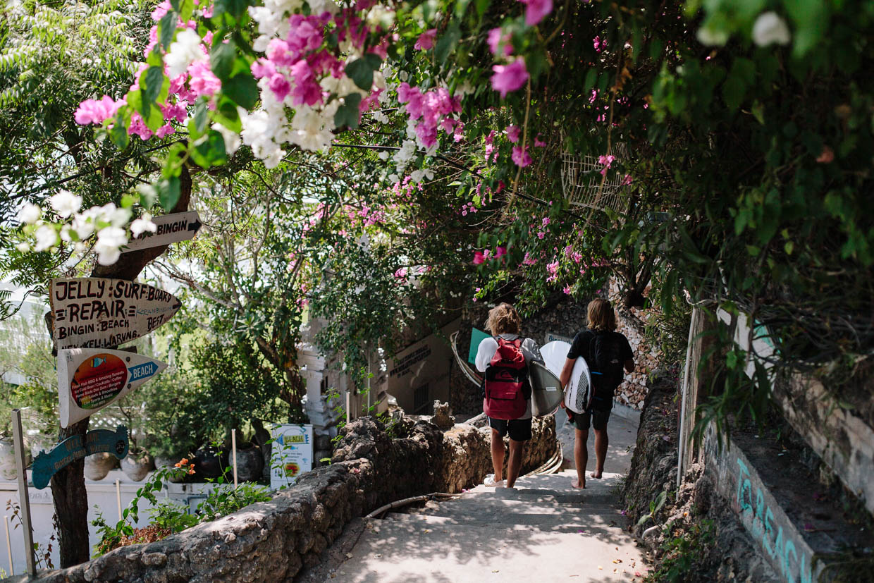 The Temple Lodge Frothers walking down the cliff stairs to Bingin Beach.  