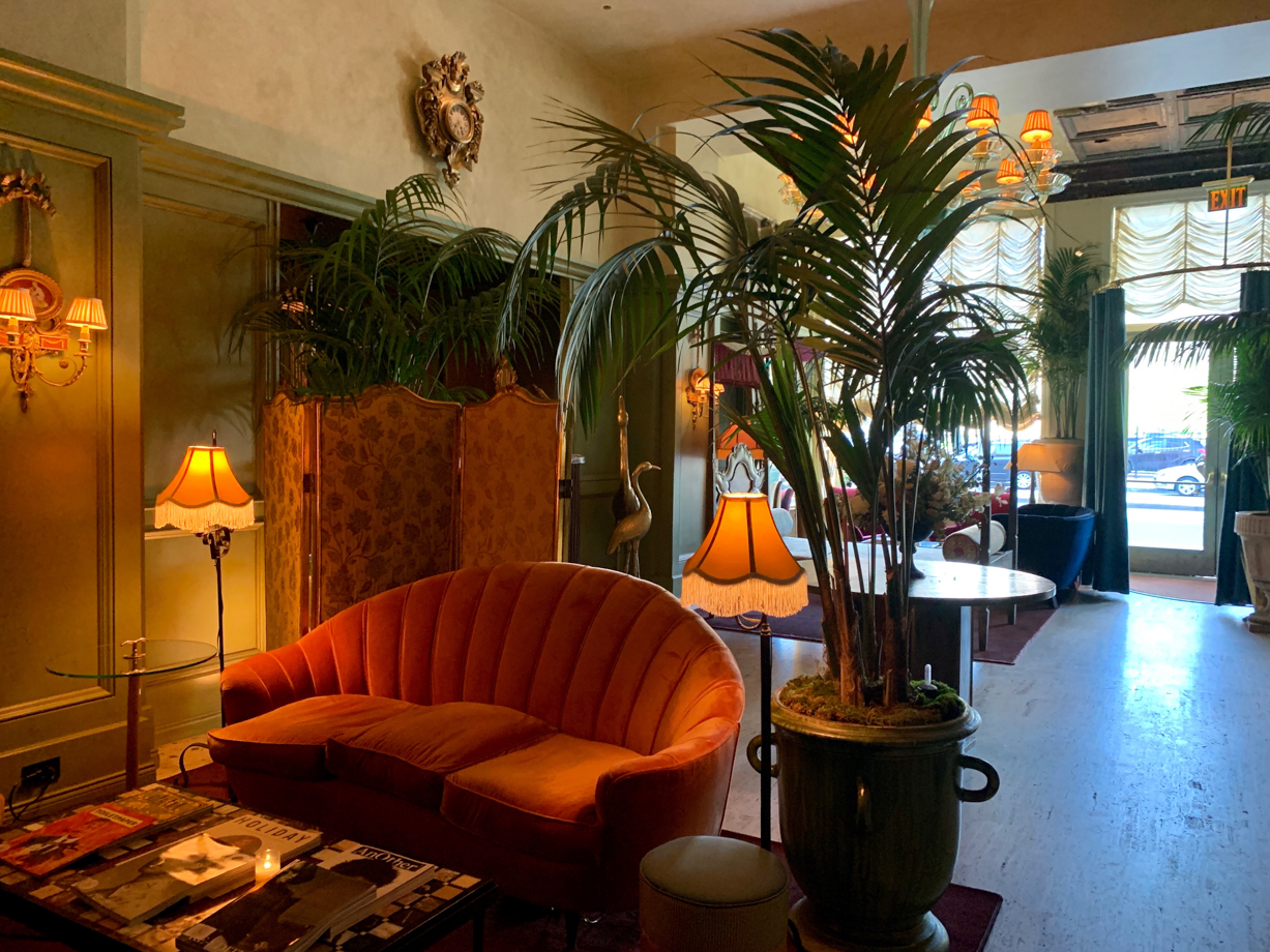 The Siren Hotel The lobby is total romance, with velvet chairs, custom and vintage furniture, big antique mirrors and leafy plants. 