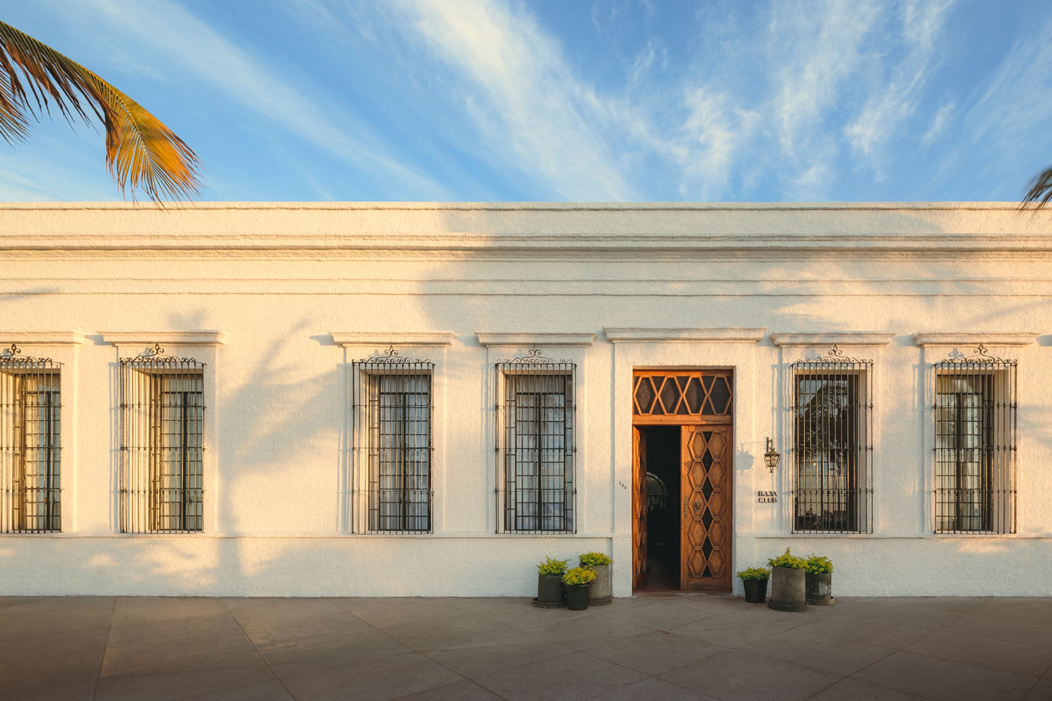 Baja Club Baja Club, the newest addition to Grupo Habita family, is located right in front of the Sea of Cortez, in a beautiful 1910 building that belonged to a local pearl trader back in the day.