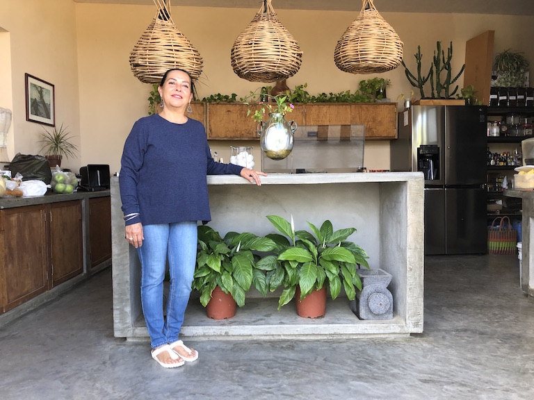 Hotel Palmar Claudia, the owner and chef-architect of Palmar in her kitchen.