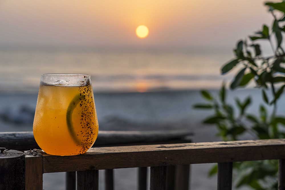 Blue Apple Beach Catch the sunset sippin' on one of their many tropical fruit cocktails