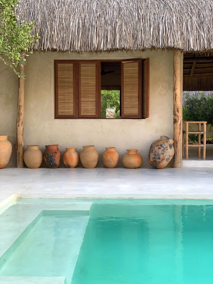 African-crafted pottery by the poolside