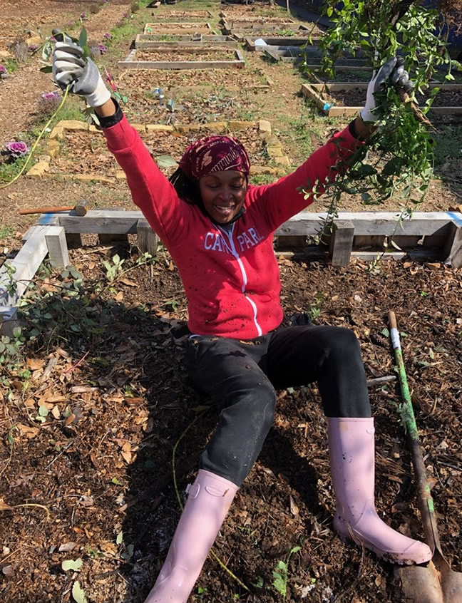 Keyatta in her plot at the Sip of Paradise Garden for local Atlanta bartenders. Photo by Rori Robinson