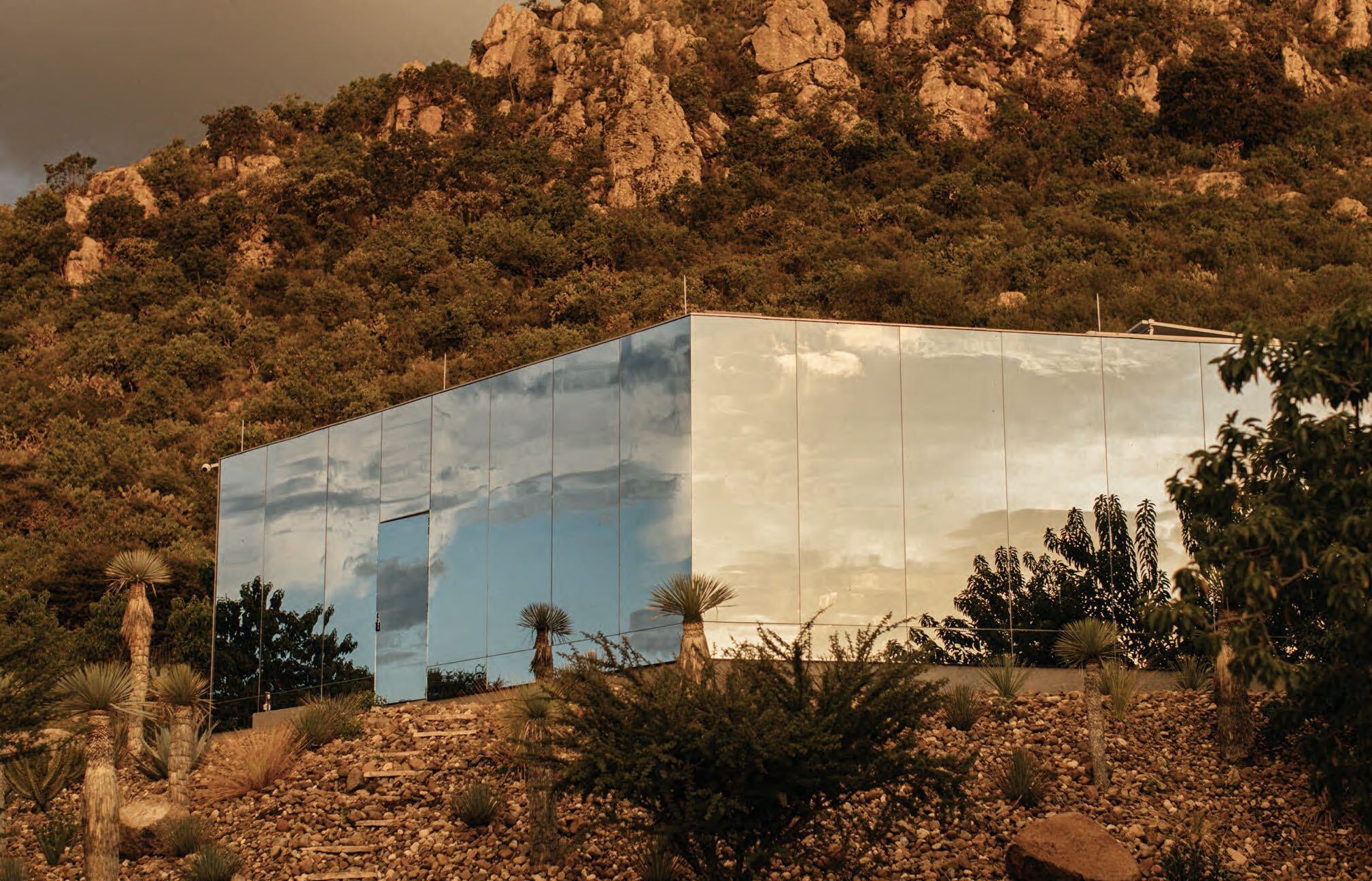 Casa Etérea in San Miguel de Allende, Mexico, runs on solar energy, collects rainwater, and uses a patterned ultraviolet coating on the mirror making it visible to birds while remaining reflective to the human eye