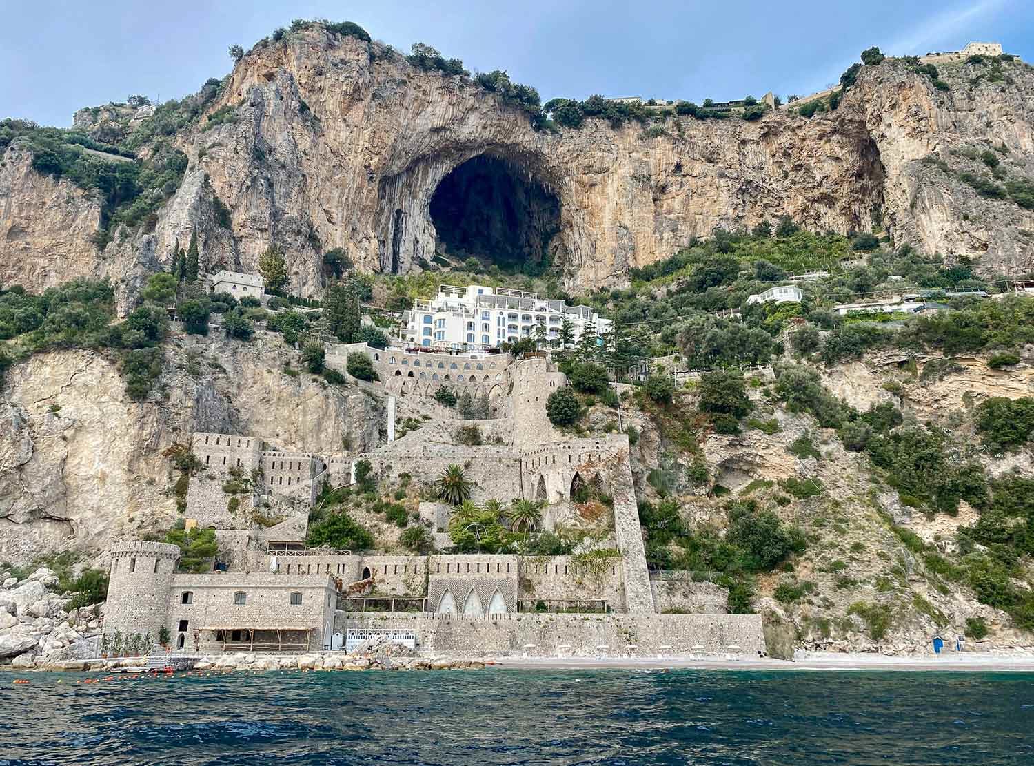 Borgo Santandrea Built into the cliffs above the centuries old fishing village of Conca dei Marini, the hotel is suspended 90 meters above sea level and winds all the way down to a private beach