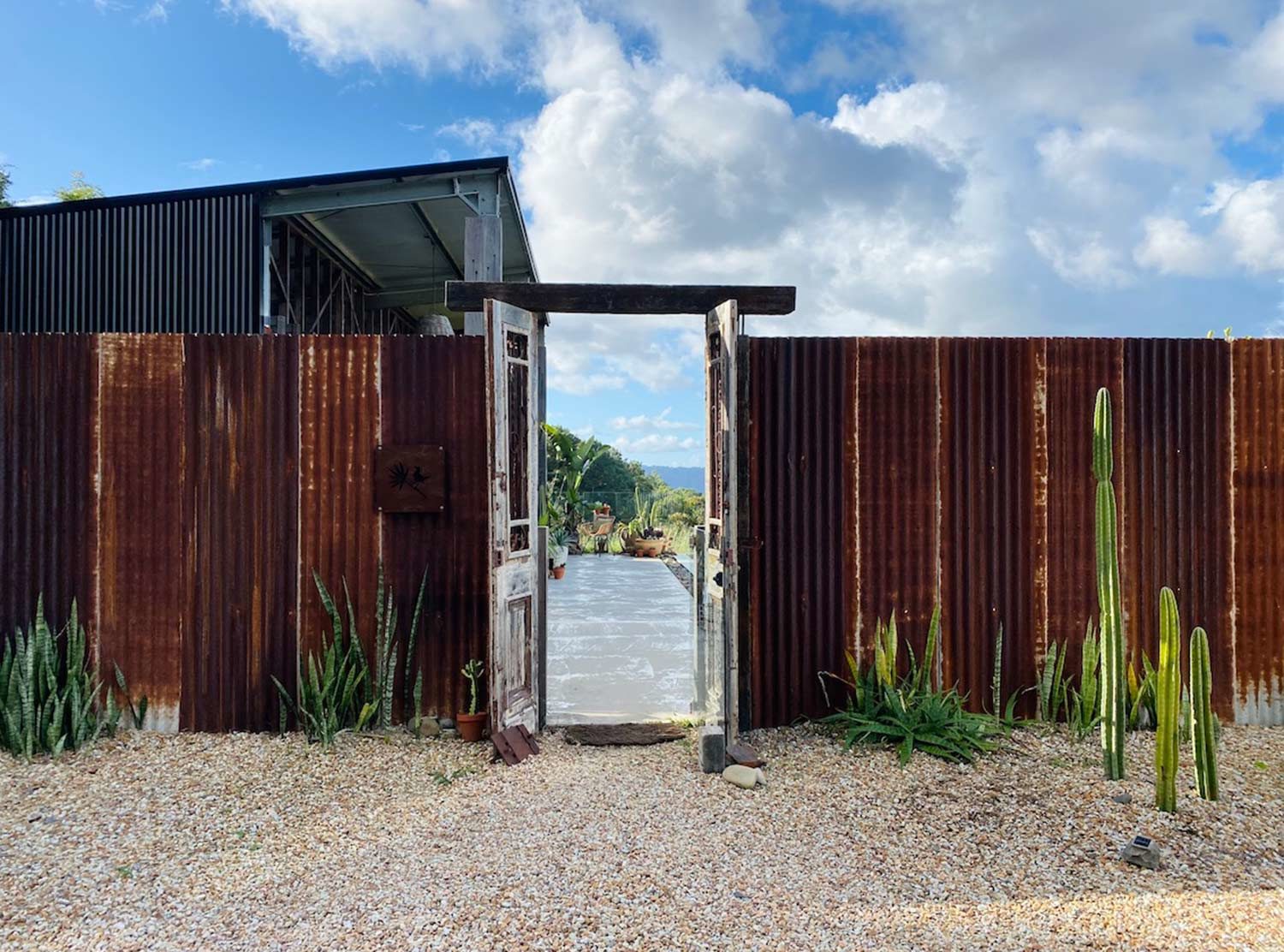 Blackbird Byron The industrial style entrance that takes you into the pool area and main dining pavilion