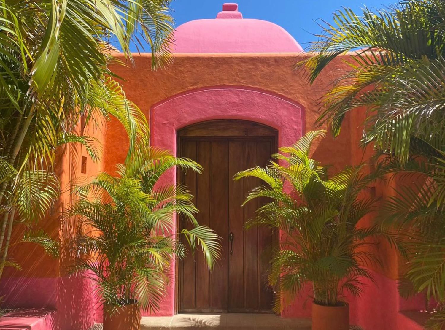 Las Alamandas The hotel's iconic pink dome, entrance to Casa del Domo