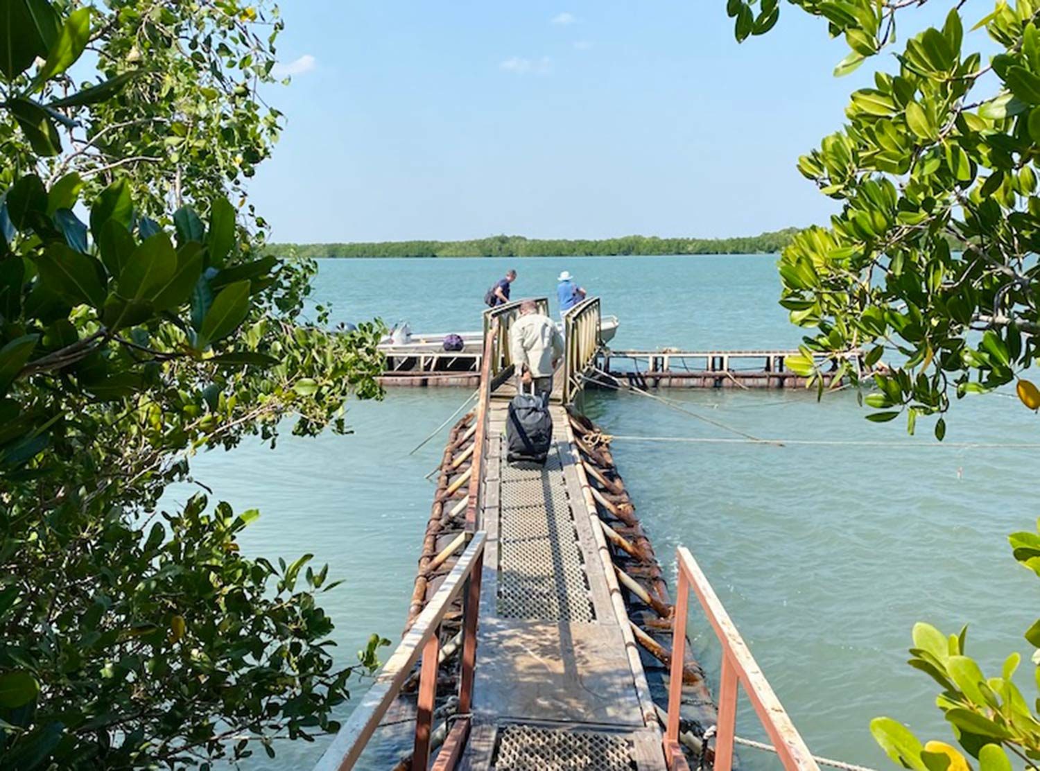 Tiwi Island Retreat After arriving on a tiny 6-seater plane, you will be met at the red dirt runway by the friendly retreat staff (in our case, Robbo), where your luggage is collected and led down to a little tin boat that takes you around the croc-infested (!) mangroves to the retreat