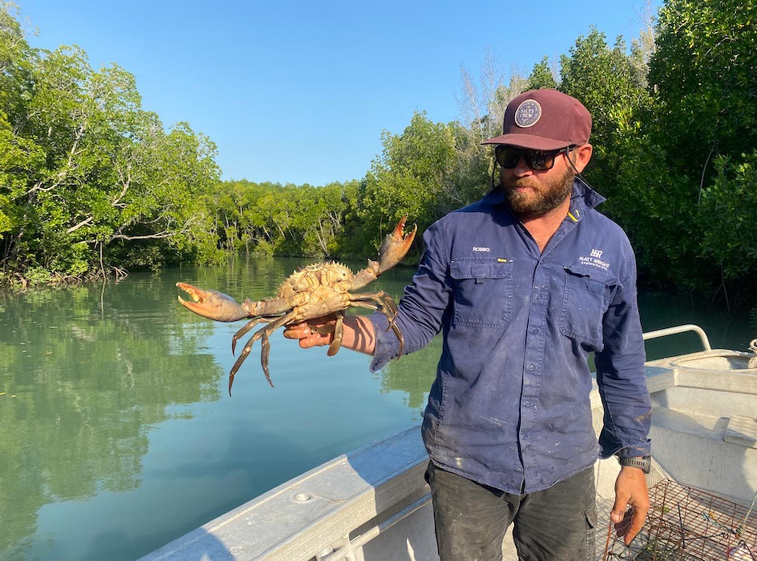 Tiwi Island Retreat Boat trips with Robbo are always fun — out looking for mud crabs — dropping off the cages in the morning, and going back later in the day to see what has been caught. Success!