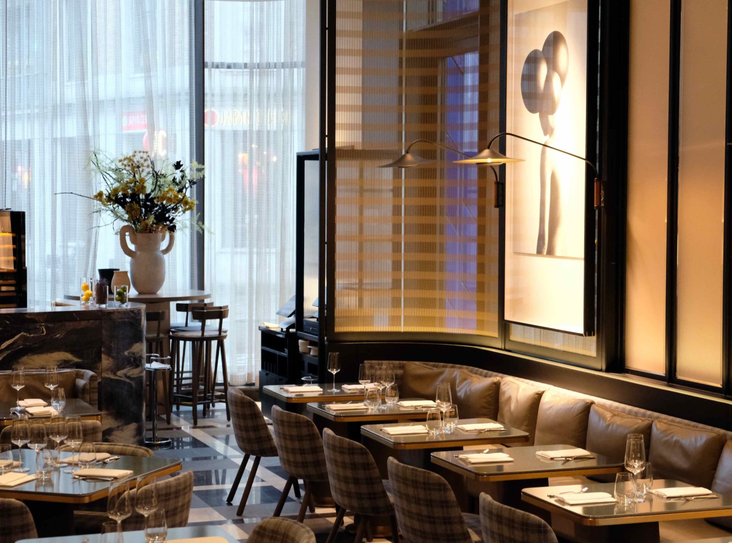 The Londoner Whitcombs, one of three restaurants on the property, serving French Mediterranean, is a large restaurant, but with a clever layout, columns and curtained room separators, feels and sounds very intimate