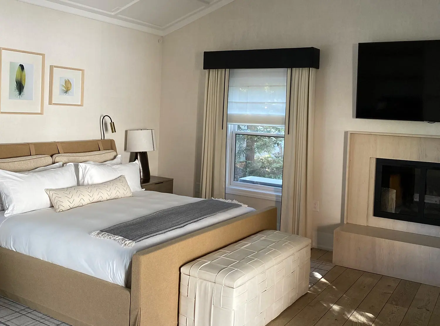 MacArthur Place Our beautiful room with neutral colors and plenty of textures to create a serene environment to unwind in. The fireplace was an added cozy touch!