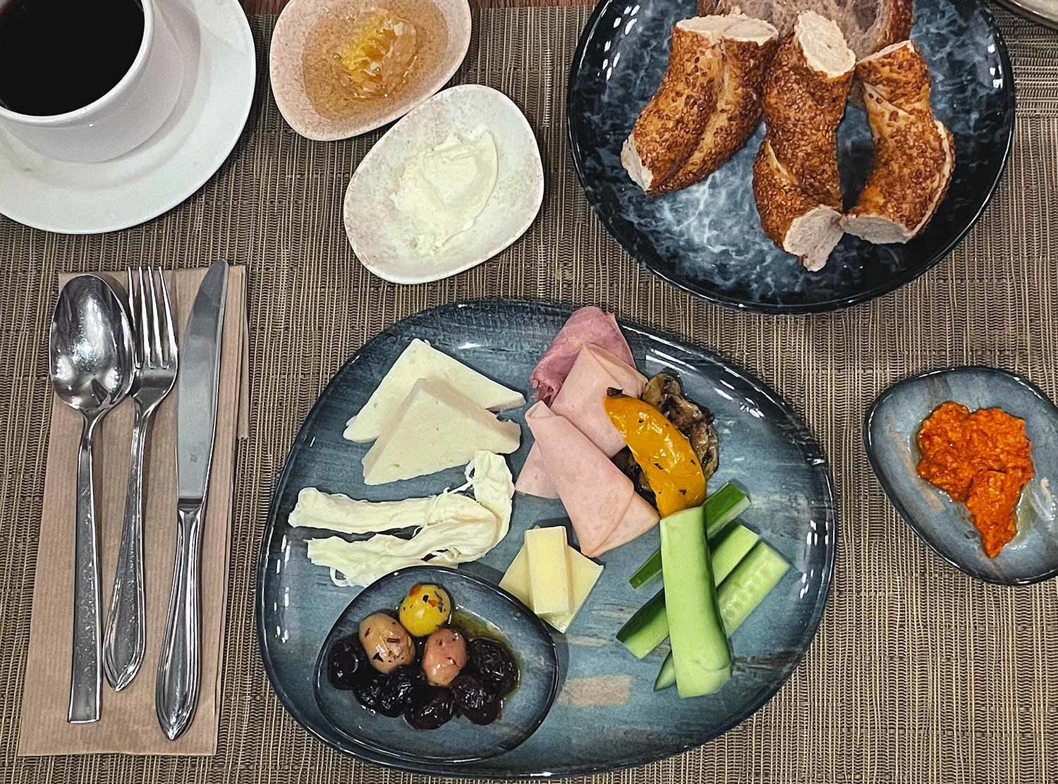 The Bank Hotel Istanbul The Turkish breakfast! Oh man oh man, move over Aussies, this is a serious breakfast rival for you. Insider tip, kaymak and honeycomb honey on simit bread, a match made in breakfast heaven!