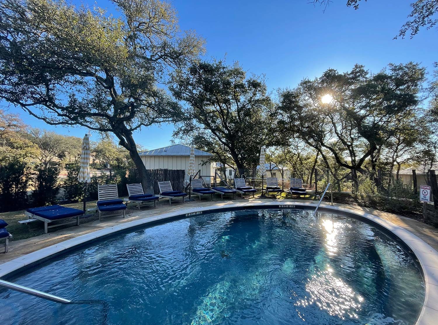 The Wayback The outdoor pool is surrounded by oak trees and perfect for a dip on hot Austin afternoons. There’s a cabana with towels, drinks, and fun reads