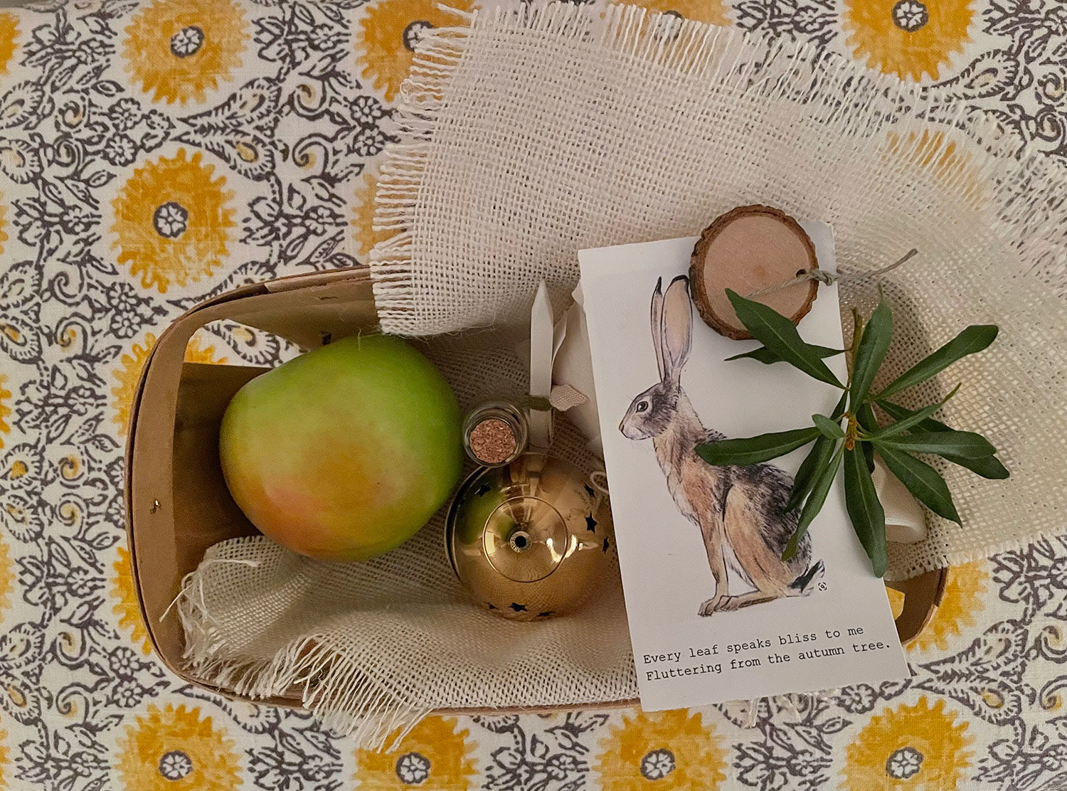 The Wayback A curated welcome basket of goods including bath salts, incense, and a snack