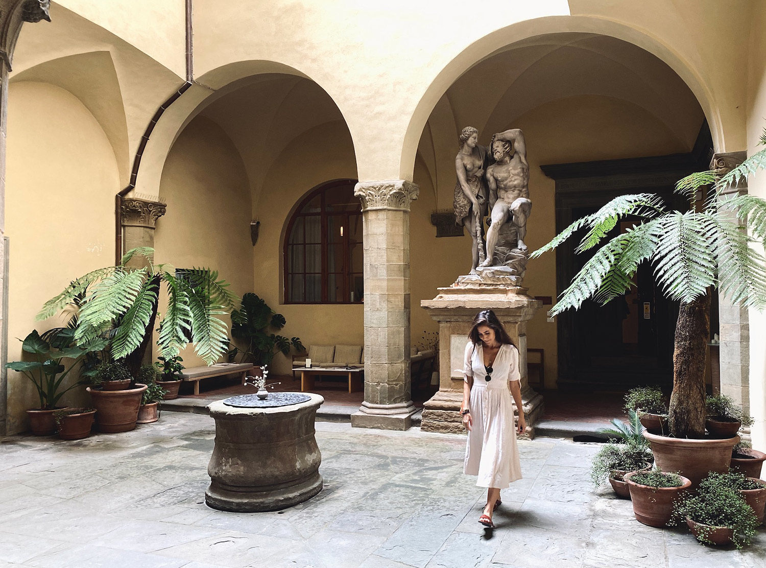 Numeroventi The courtyard of Palazzo Galli Tassi, which doubles as the hotel lobby