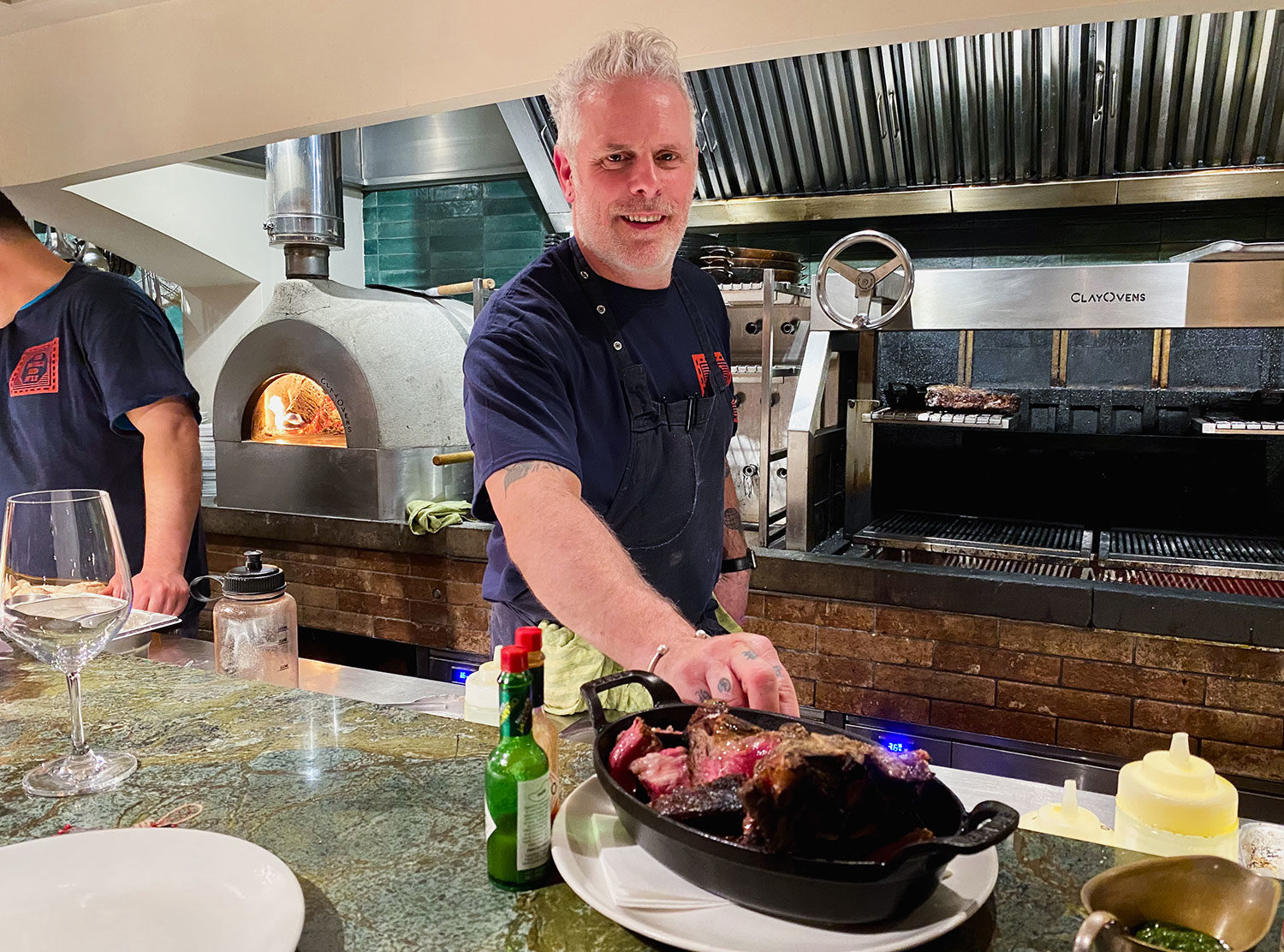 The Double Red Duke Paul serving up our perfectly cooked Porterhouse straight from the fire pit 