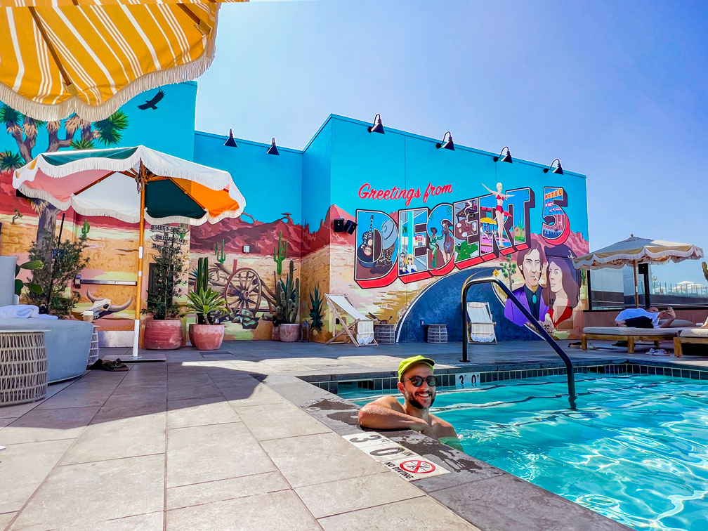 tommie Hollywood Cooling down in the pool. The mural is an iconic symbol for the property
