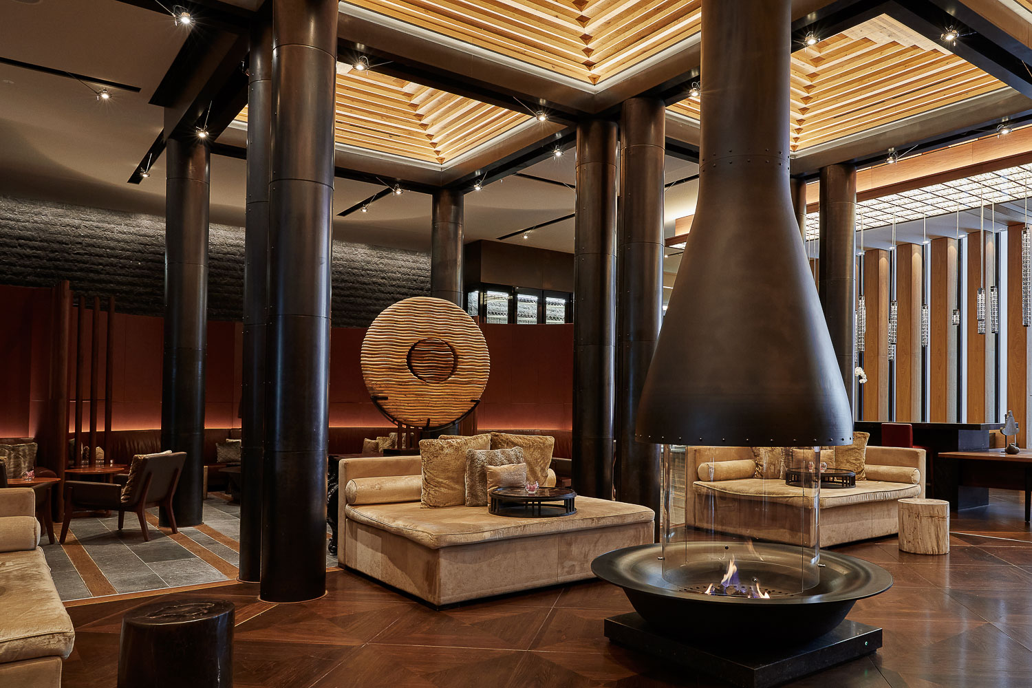 The Chedi Andermatt Cozy up by the centerpiece fireplace and sip either tea or champagne. The lounge can be enjoyed at all hours of the day