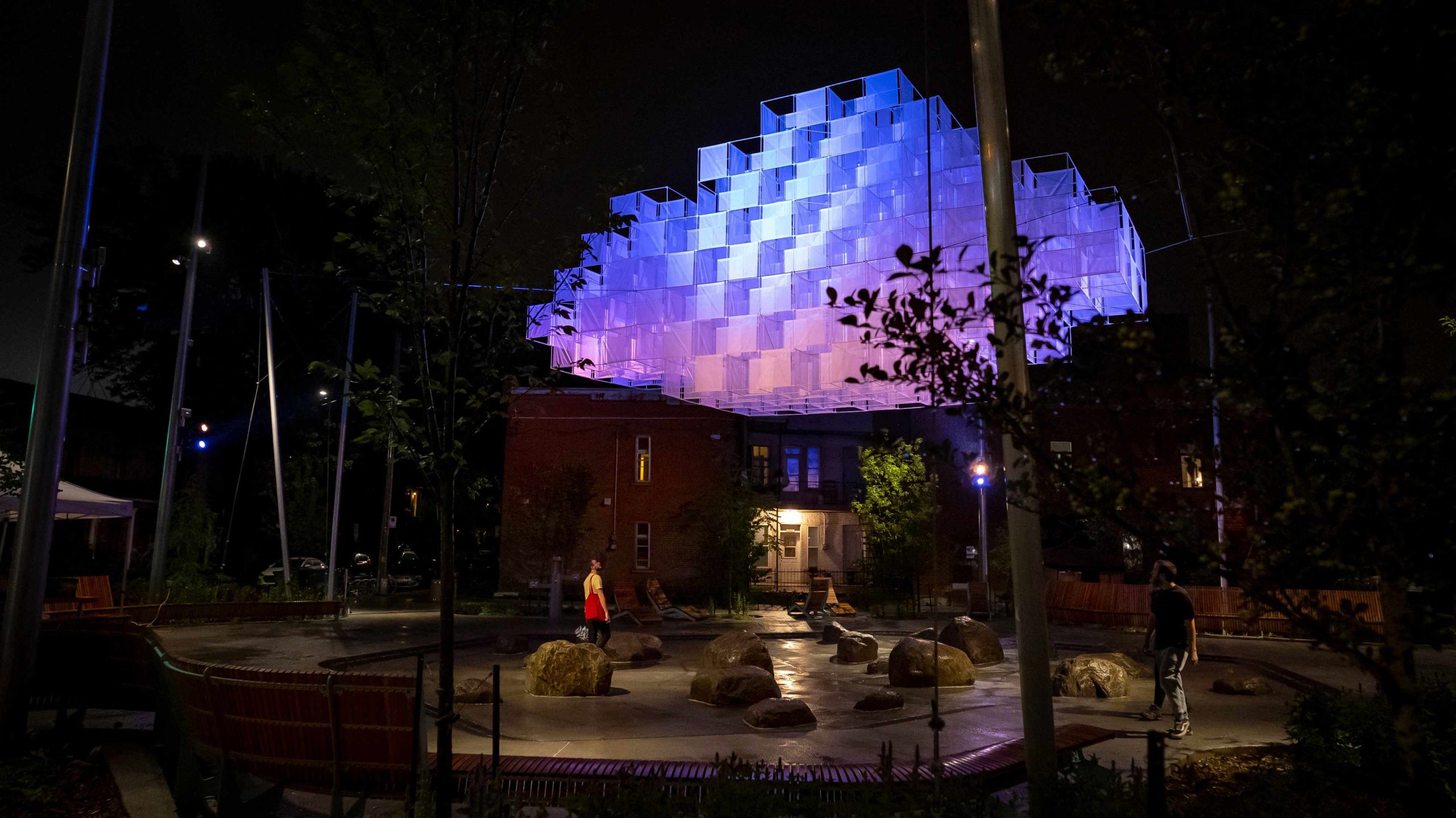 The cloud changes and reflects colors based on 12-hour weather forecasts. Photo by Latrompette Studio