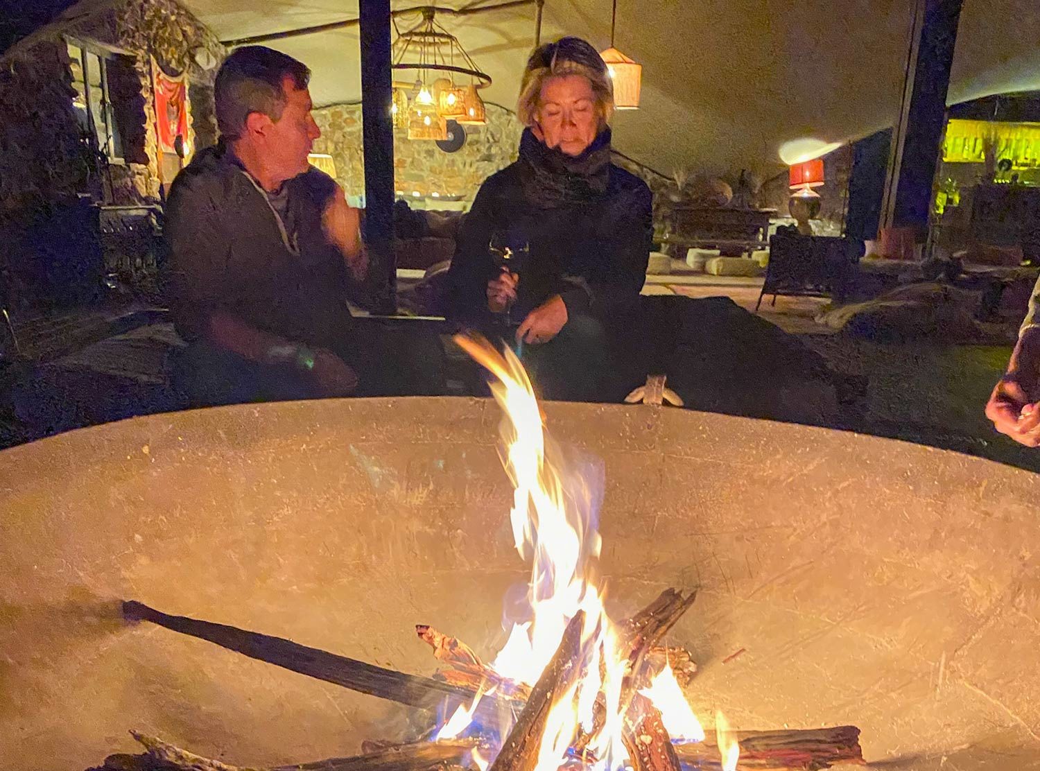 Habitas Namibia Swapping stories with fellow guests over the firepit