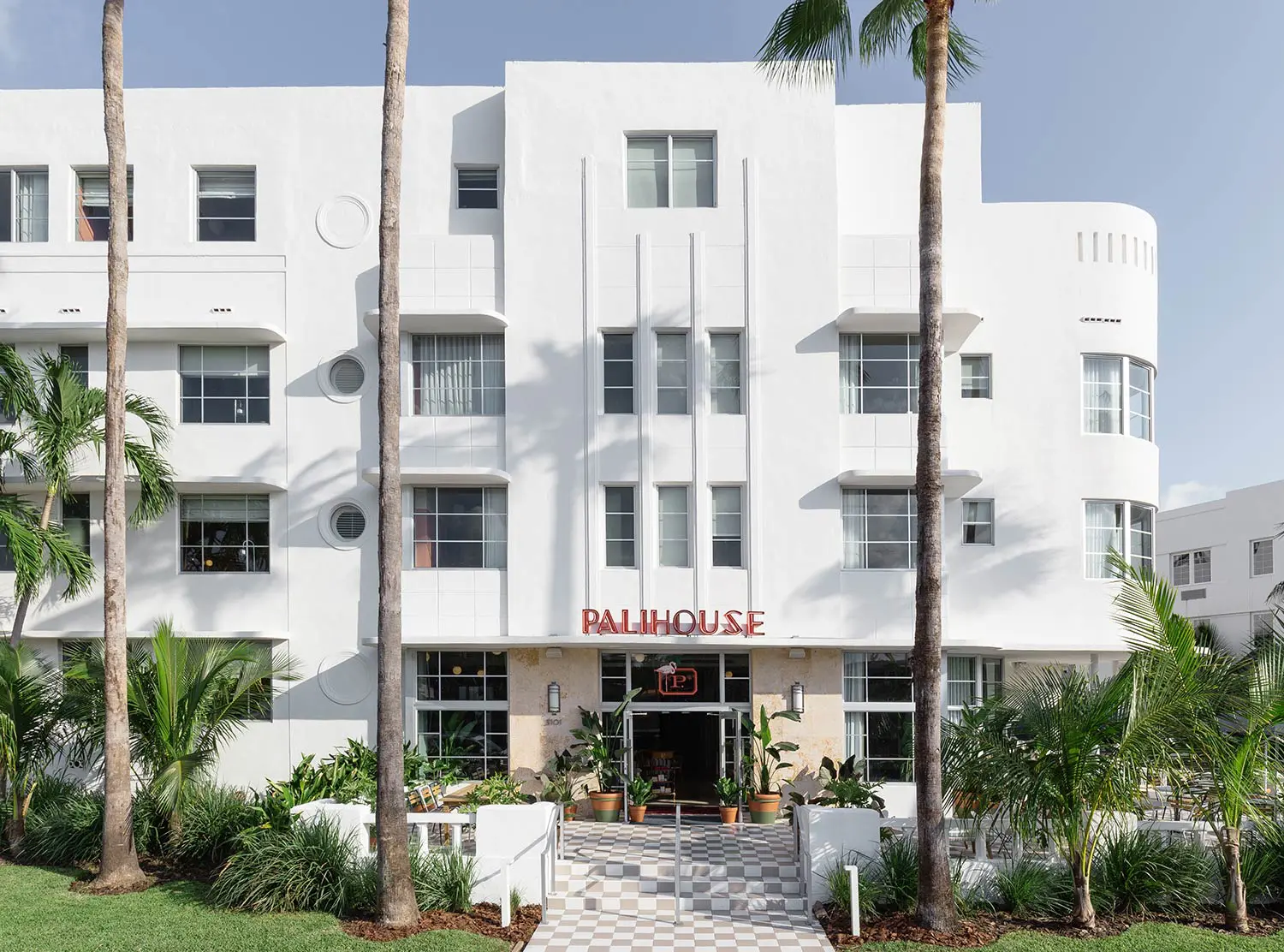 The gorgeous façade of the ‘40s era Greenbriar Hotel is now home to  Palisociety’s Miami outpost 