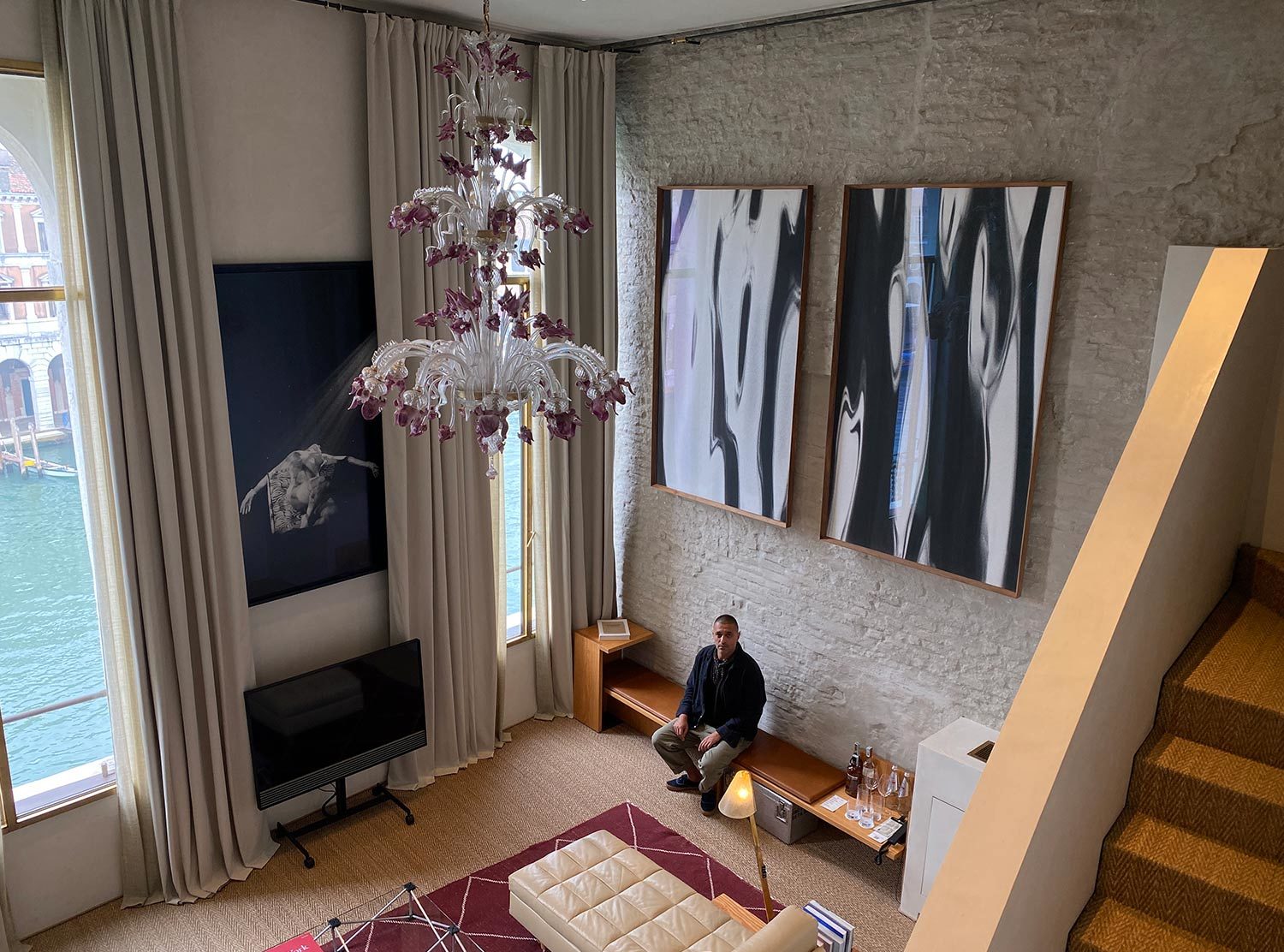 The Venice Venice Hotel The scale of Room 25 is remarkable: Impressive high ceilings and oversized artworks by Venetian photographer Renato Dagostin